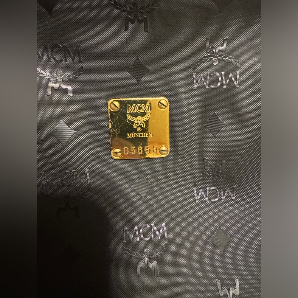 MCM Black Toiletry Bag with Gold Accents
